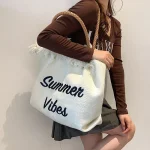 Women Fashion Casual Tassel Design Letter Embroidery Solid Color Canvas Shoulder Bag - Image 4